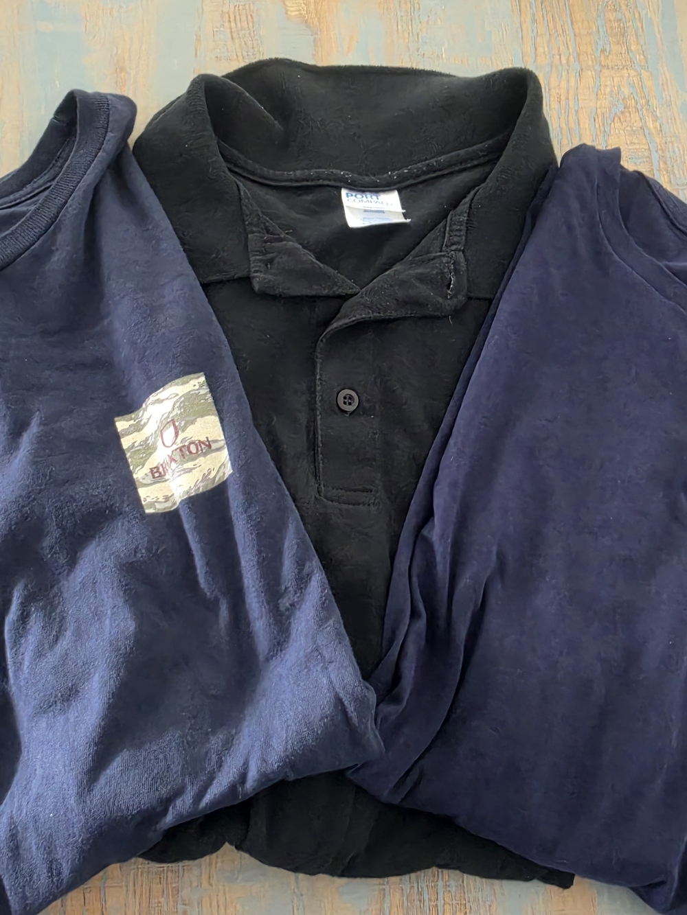 Navy Brixton T, Under Armour Navy American Flag T, & Black Port Company Polo